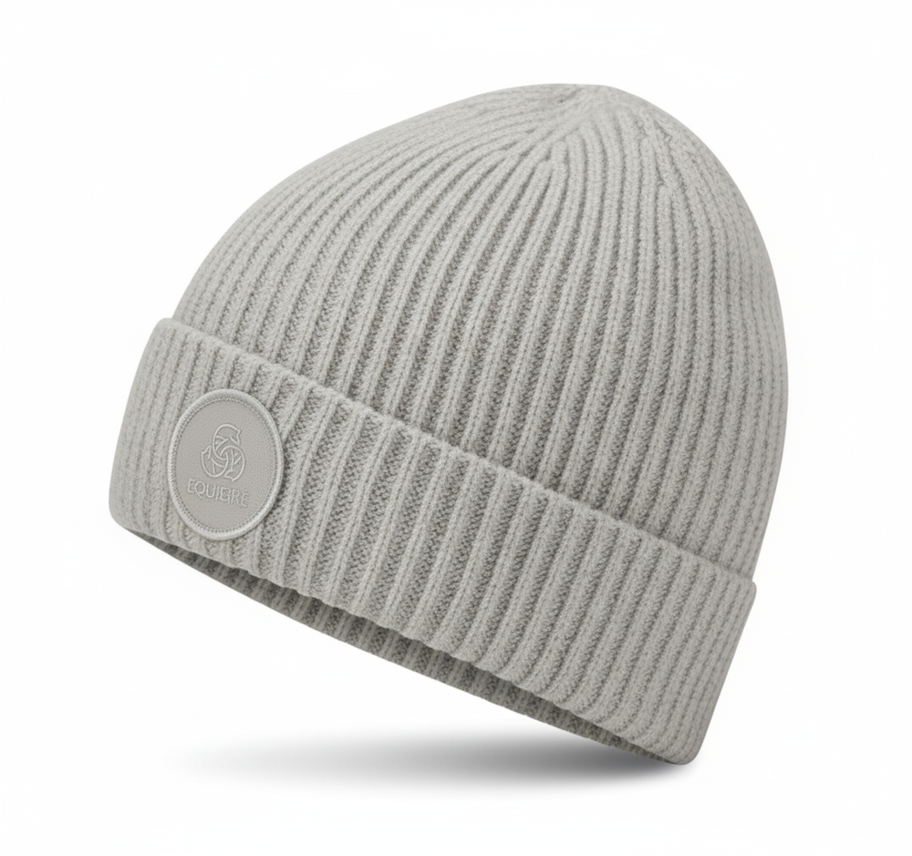 Gray knit beanie with a brand logo on a white background