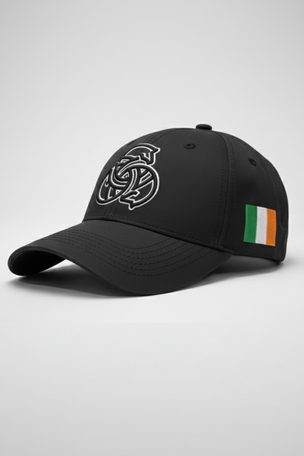 Black cap with a logo and Irish flag on a light gray background